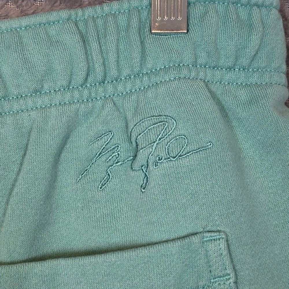 Jordan Mens Essentials Fleece Shorts Teal Green Jumpman DA9822-440 Size Small